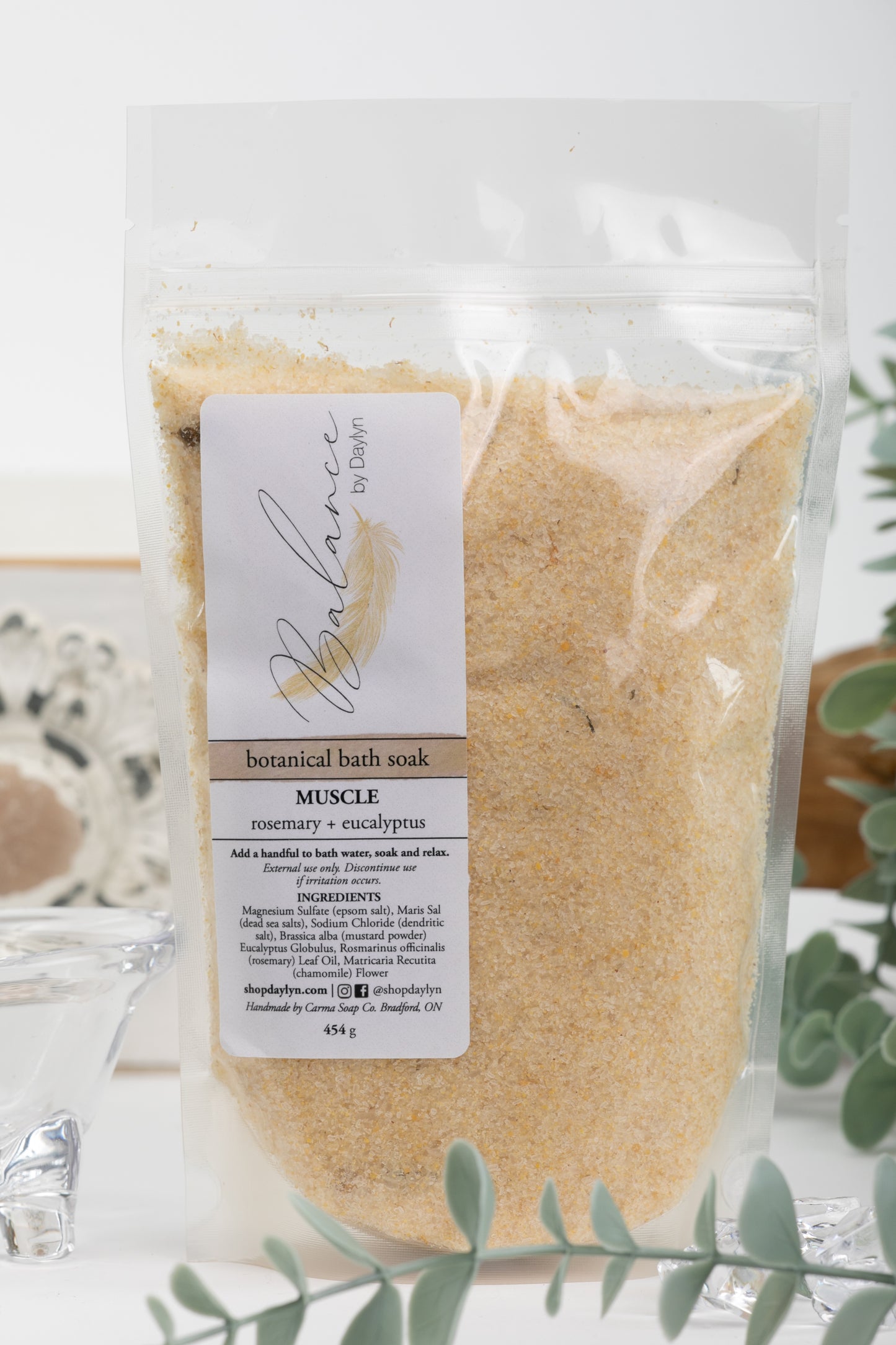 muscle botanical bath soak, bath salt, mixed with epsom salt, dead sea salts, rosemary oil, and chamomile Flower. made in Canada.