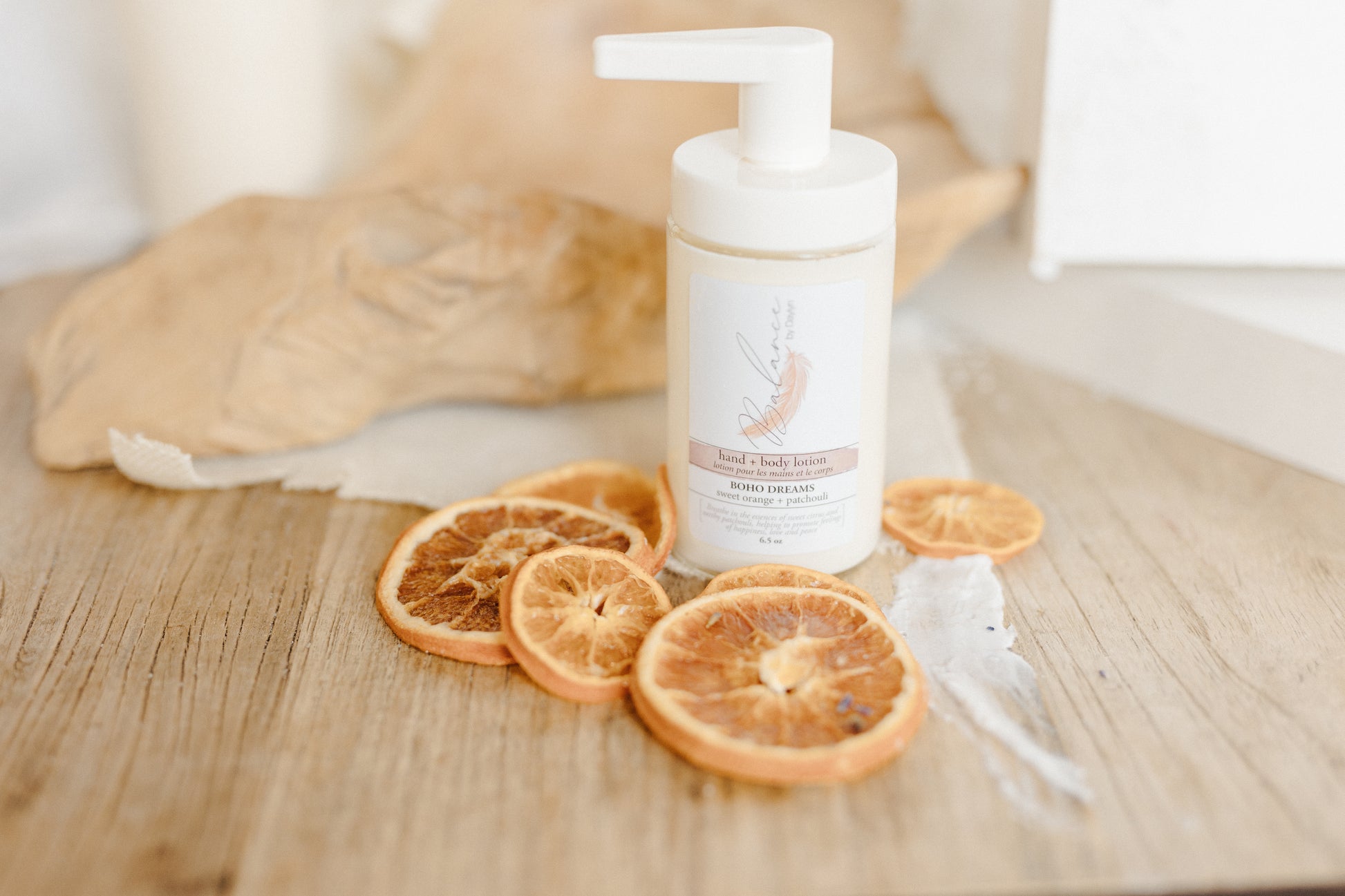 handcrafted sweet orange and patchouli boho dreams hand and body lotion by balance by daylyn newmarket