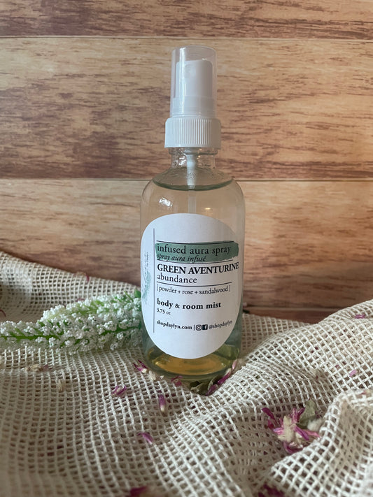 aura spray, body and room mist mixed with sandalwood, rose, and powder. perfect for a refreshing scent for your home or when you're stepping out.